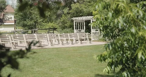 Walking out from behind the trees to reveal the beautiful outdoor wedding 스톡 동영상 152175090