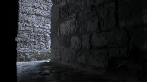 Walking out of dark Medieval Castle into the light Stock Footage 128641708
