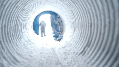 Walking Out of a Glacier Tunnel Stock Footage 90824663