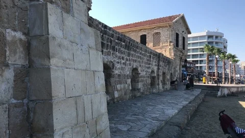 Walking out of Larnaca Castle Stock-Footage 89585556