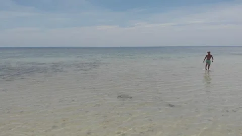 Walking out of the sea Stock Footage 260431183