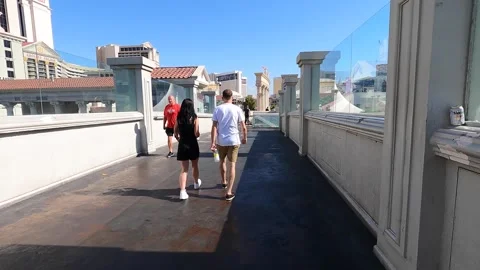 Walking outside Caesars Palace in Las Vegas  Stock Footage 269667305