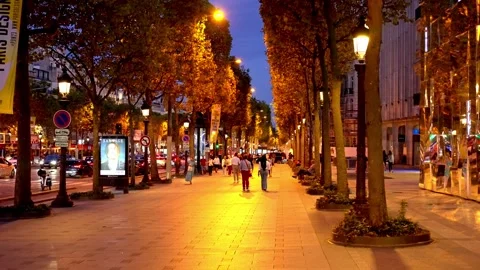 Walking over the Champs Elysee Avenue in Paris by night - CITY OF PARIS, FRANCE Stock Footage 258181696