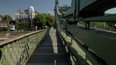 Walking over Hammersmith Bridge Video stock 91503994