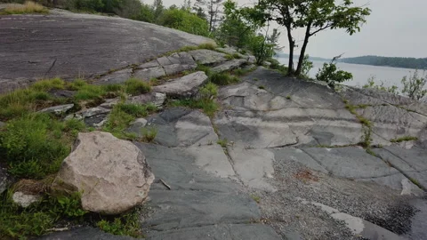 Walking Over Old Granite Rock Formations Above Wilderness Lake And Oak Landscape Stock Footage 200666403