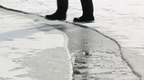Walking over a rift in ice Stock Footage 36459516