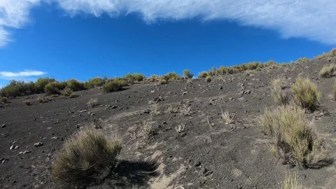 Walking over volcanic soil, debris, towards malacara volcano Stockbeeldmateriaal 97196348
