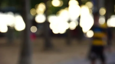 Walking in a park de-focused right to left. Stock Footage 25667812