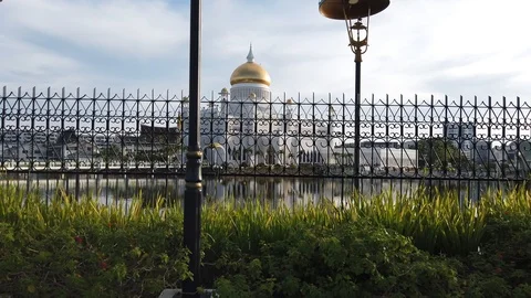 Walking passed through Sultan Omar Ali Saifuddin Mosque Stock Footage 101144170