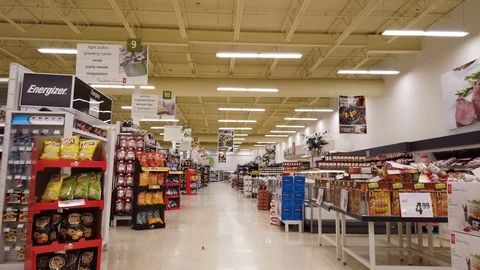 Walking Past Aisles In Grocery Store Supermarket With Meat And Other Aisles Stock Footage