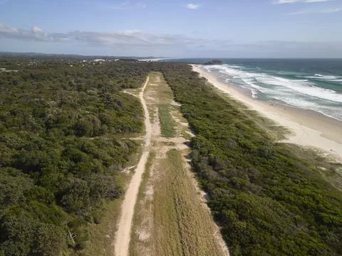 Walking path along the beach Stock Photos