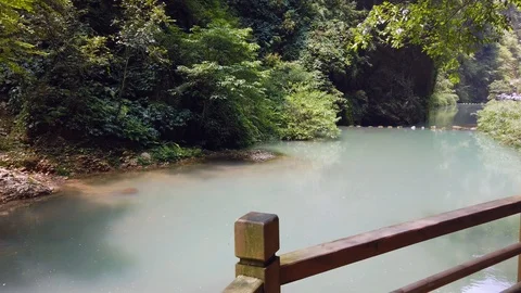 Walking path along a river in Grand Canyon in China Stock Footage 117807884