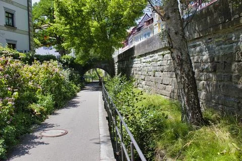 Walking path alongside the Andelbach stream in überlingen Stock Photos