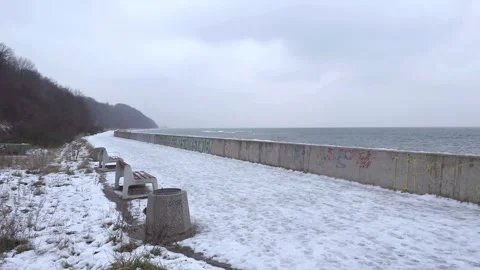 Walking path by the Baltic Sea in Gdynia, Poland during winter. Stock Footage 258884344