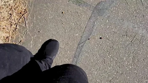 Walking on a path black pants and shoes 库存影片 82271129