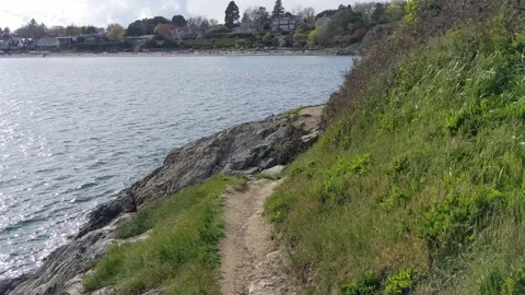 Walking the path at Cattle Point Stock Footage 190819261