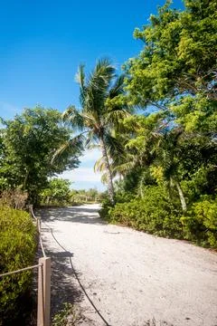 A walking path at Lighthouse Beach Park in Sanibel, Florida Stock Photos