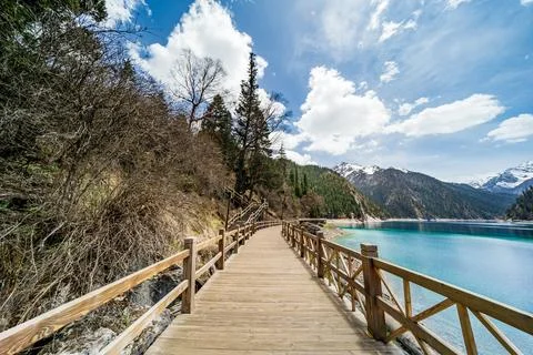 Walking path at Long Lake, aka Chang Hai, in Jiuzhai Valley National Park, .. Stock Photos