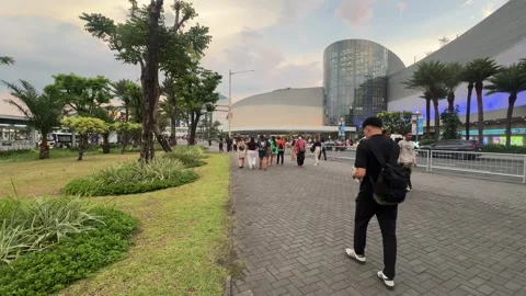 Walking Path with MOA Building Backdrop 4K 60fps Stock Footage 338350401