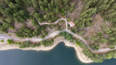 Walking path near small lake Stock Footage 143966062
