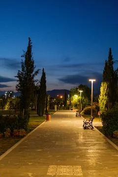 Walking Path in a Park at Night Foto stock