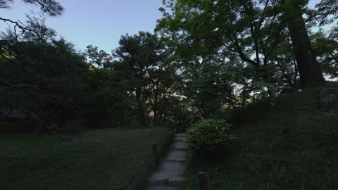 Walking on path in Shukkeien Garden, Hiroshima Stock Footage 341374594