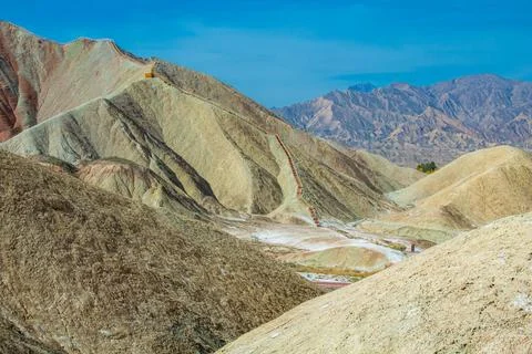 Walking path through Rainbow mountains in Zhangye Danxia National Geopark, .. Stock Photos