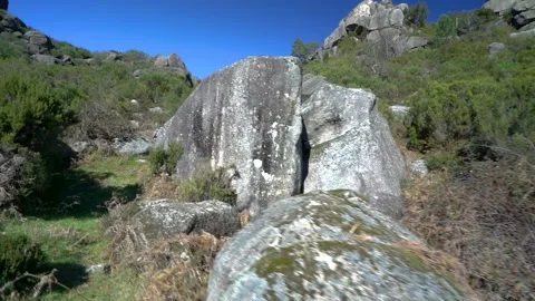 Walking off the path through rocky landscape in Portugal national park Video stock 264099405