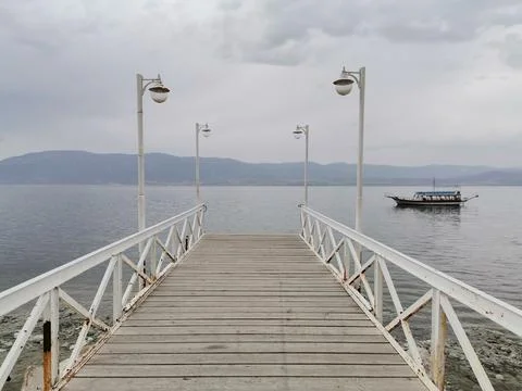 Walking path towards the lake. Stock Photos