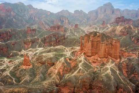 Walking paths around sandstone rock formation at Zhangye Danxia National Geologi Stock Photos