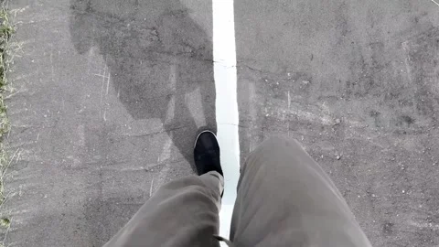 Walking on a Pathway with Focused Steps Stock Footage 313835043