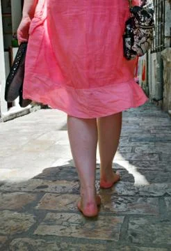 Walking on pavement Stock Photos