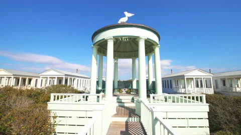 Walking at pavilion to view of cityscape of Seaside, Florida Stock Footage 160179326