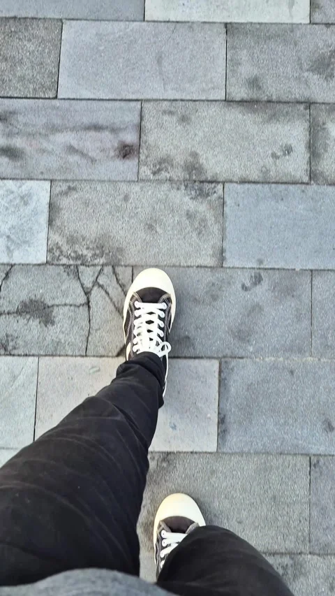 Walking on a paving road Stock Footage 294956766