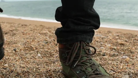 Walking on pebble beach, close up 스톡 동영상 81031794