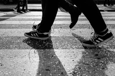 Walking on  pedestrian crossing Stock Photos