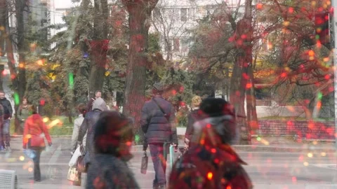 Walking people. Reflection in a street display window shop. Brilliant moving Stock Footage 131064343