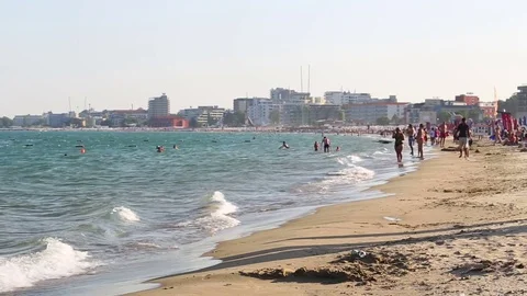 Walking people on sand beach Video stock 72472393