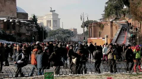 Walking People on snow near Piazza Venezia Stock Footage