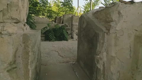 Walking point of view through Preserved remains of the ancient royal bath s.. Stock Footage 311217419