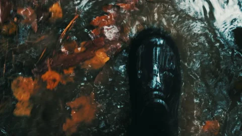 Walking in a puddle. 4K POV top view of rubber boots wading in the water. Autumn Stock Footage 142161343