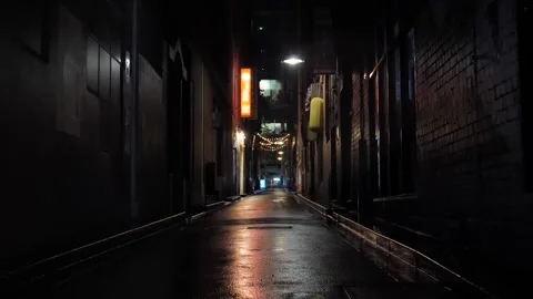 Walking by a quiet Melbourne laneway during the nightly COVID curfew. A Stock Footage 149173022