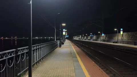 Walking at a quiet station Stock Footage 316941997