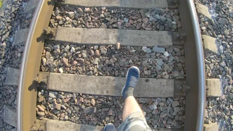 Walking on Railroad Tracks Wide Angle Distorted POV Perspective 4k60fps Stock Footage 135635581