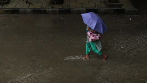 Walking-in-the-rain-3 Stock Footage 139950293