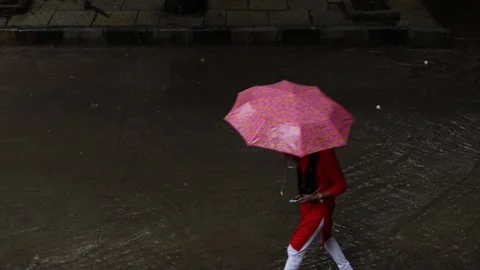 Walking-in-the-rain-India-5 Stock Footage 139919388