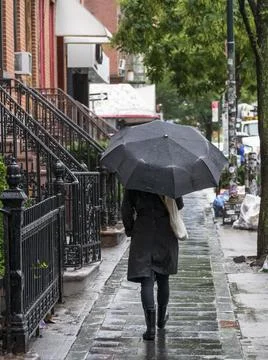 Walking in the rain Stock Photos