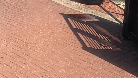 Walking on red and white pavers Stock Footage 155753226