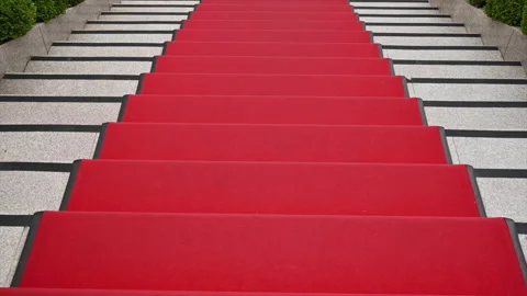 Walking on red carpet stairs Stock Footage 162047029