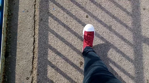 Walking in red 스톡 동영상 118189668